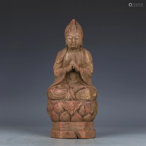 A CHINESE WOOD BUDDHA ORNAMENTS