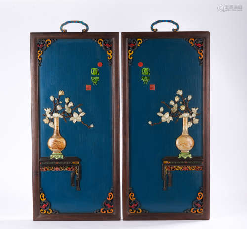 A pair of wood hanging panel
