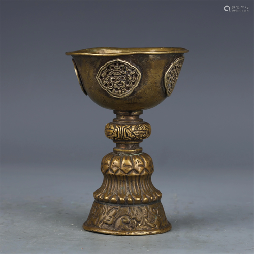 A CHINESE BRONZE TRIBUTE LAMP