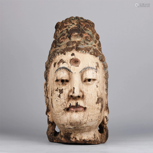 A CHINESE WOOD BUDDHA TOP