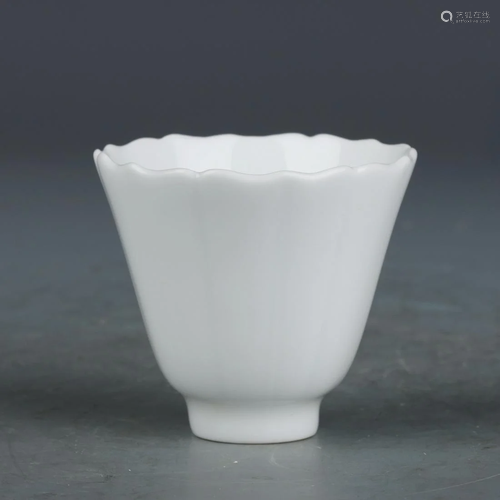 A CHINESE WHITE GLAZED PORCELAIN CUP