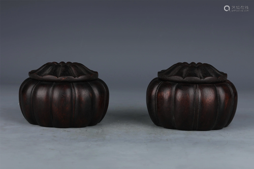 A CHINESE ROSEWOOD CARVED MELON SHAPED WEIQI BOX