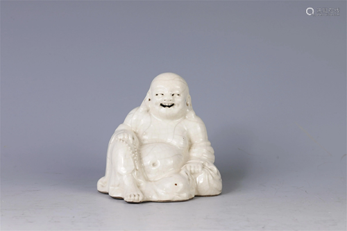 A CHINESE PORCELAIN MAITREYA BUDDHA