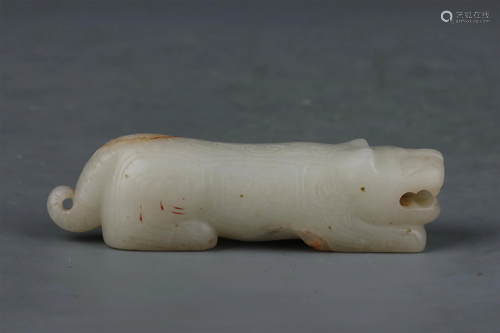 A CHINESE WHITE JADE CARVED JADE TIGER ORNAMENTS