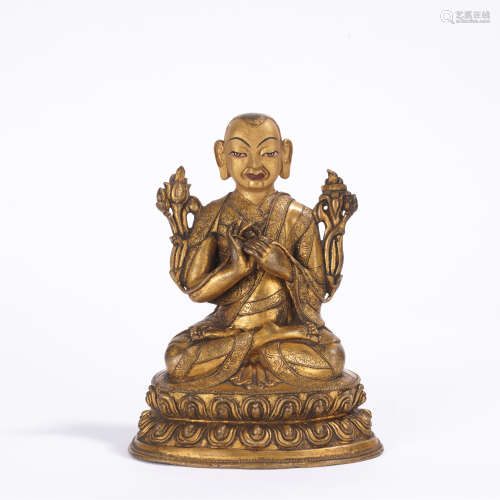 A gilt-bronze statue of Tsongkhapa