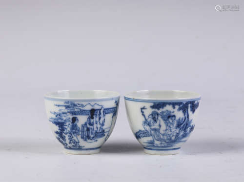 A pair of blue and white 'figure' cup