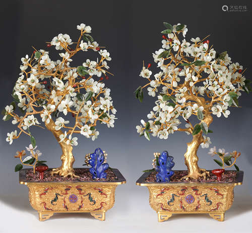 A pair of gild and jade pot