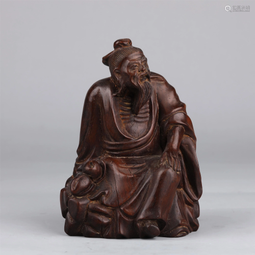 A CHINESE ROSEWOOD OLD MAN ORNAMENTS