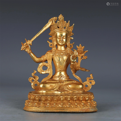 A CHINESE GILT BRONZE FIGURE OF BUDDHA SEATED STATUE