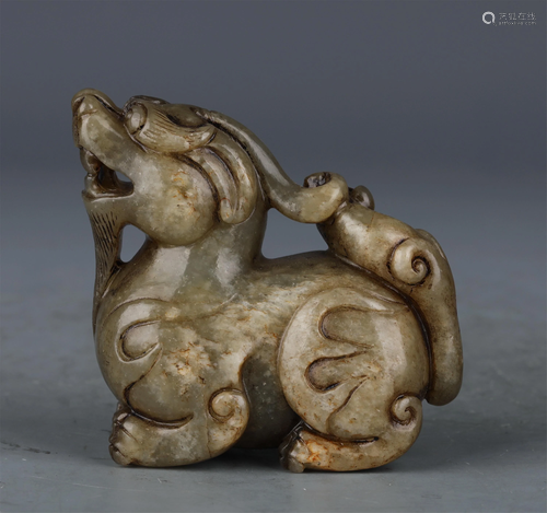 A CHINESE JADE AUSPICIOUS BEAST ORNAMENTS