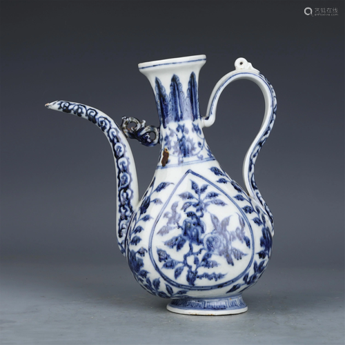 A CHINESE BLUE AND WHITE PORCELAIN HANDLED EWER