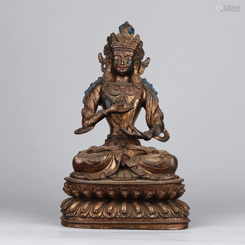 A CHINESE GILT BRONZE FIGURE OF GUANYIN BUDDHA SEAT…