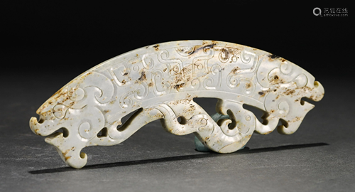 A CHINESE CARVED JADE BI