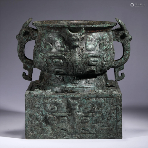 A CHINESE BRONZE BEAST-FACE RITUAL VESSEL