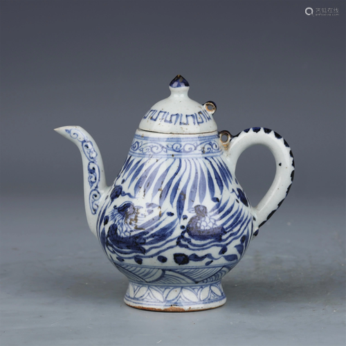 A CHINESE BLUE AND WHITE PORCELAIN HANDLED EWER