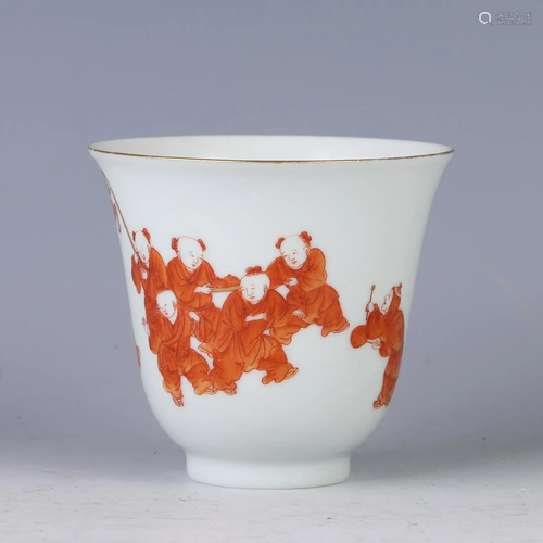 A CHINESE IRON RED GLAZED PORCELAIN CUP