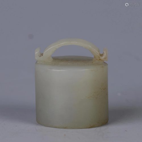 A CHINESE LIGHT GREENISH WHITE JADE SEAL