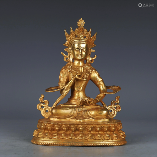 A CHINESE GILT BRONZE FIGURE OF BUDDHA SEATED STATUE