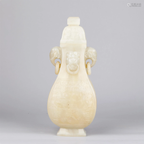 A CHINESE WHITE JADE VASE WITH COVER