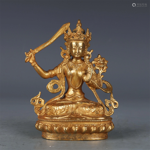 A CHINESE GILT BRONZE FIGURE OF BUDDHA SEATED STATUE