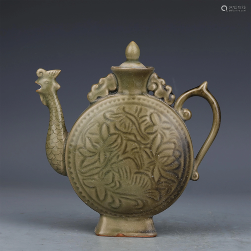 A CHINESE CELADON GLAZE PORCELAIN HANDLED EWER