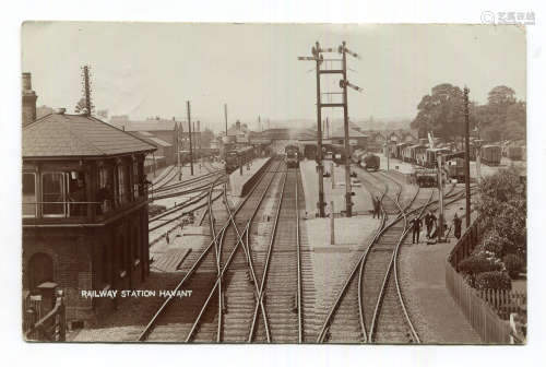 A group of 4 postcards of Sussex railway stations, including...