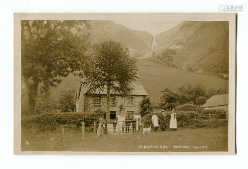 A collection of postcards of Wales, including photographic p...