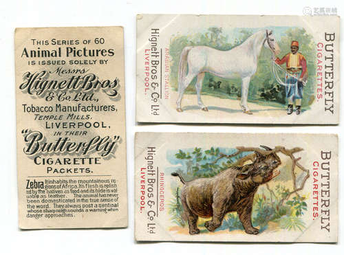 A large collection of cigarette and trade cards, including a...