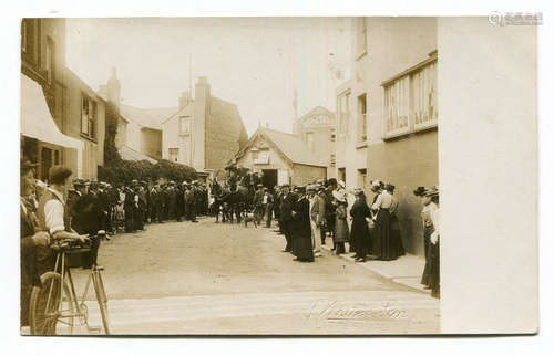 A group of 4 photographic postcards relating to the fire bri...