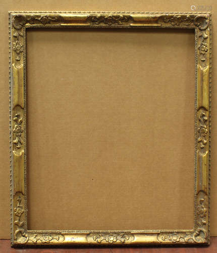 An early 20th century British gilt composition frame, rebate...