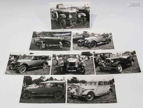 A collection of approximately 190 black and white photograph...