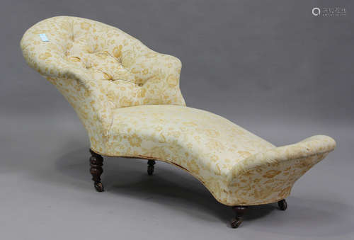 A Victorian daybed, upholstered in cream and yellow floral f...