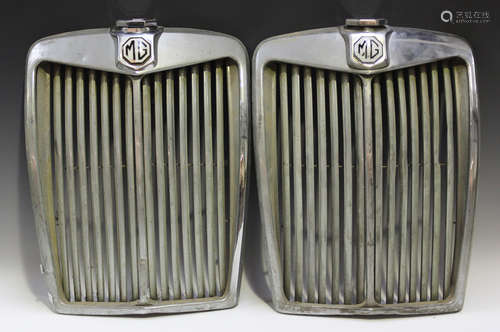 Two chromium plated MG radiator covers with enamelled badges...