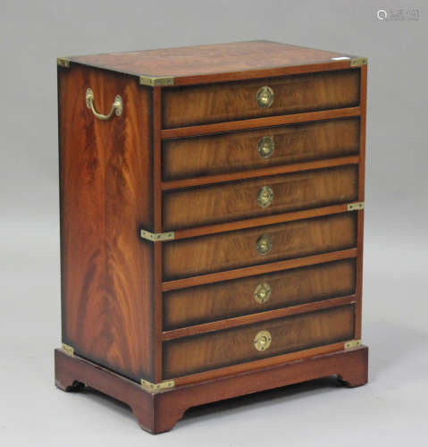 A 20th century mahogany and brass bound campaign style chest...