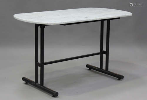 A late 20th century marble-topped bistro table with tubular ...