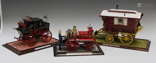 A scale model of a Merryweather horse-drawn steam fire engin...