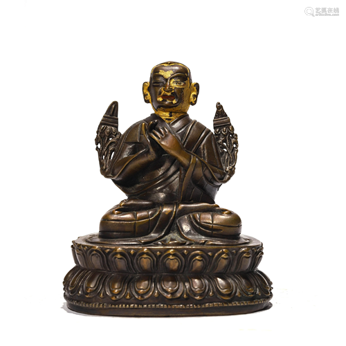 A Bronze Guru Statue