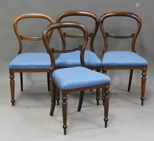 A set of six Victorian mahogany balloon back chairs, the sea...