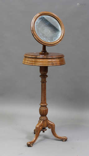 A Victorian walnut gentleman's shaving stand, on a turned co...