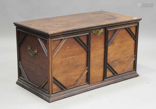 A 20th century camphor wood trunk with hinged lid and brass ...