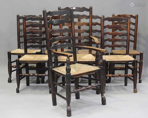 A set of eight 19th century ash ladder back dining chairs wi...