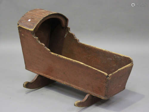 A 19th century painted pine child's rocking cradle with cano...