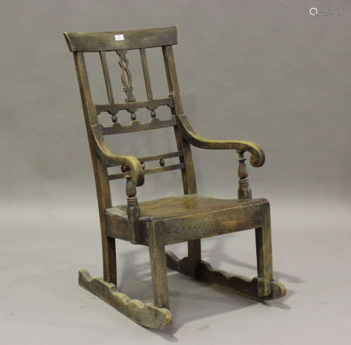 An 18th century provincial Scottish elm rocking chair with s...