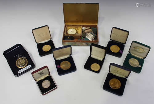 A small group of automobilia related medals, badges and awar...