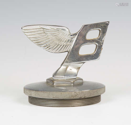 A chromium plated cast metal Bentley 'Flying B' car mascot, ...