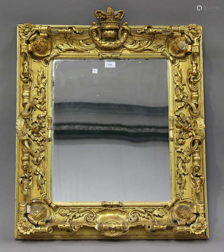 A Victorian giltwood and gesso rectangular frame, inset with...