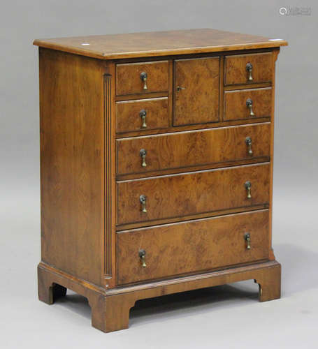 A late 20th century reproduction burr yew bachelor's chest o...