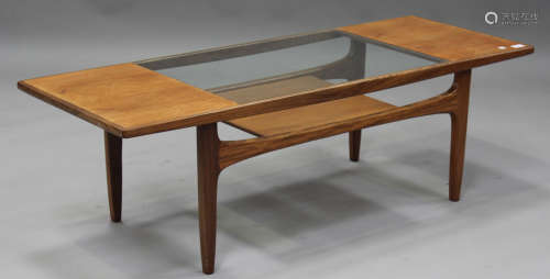 A G-Plan teak two-tier coffee table, the top inset with glas...