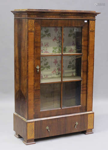 A 19th century Continental walnut display cabinet, fitted wi...