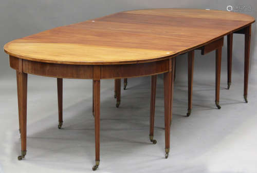 A George III mahogany 'D'-end dining table with single fall-...